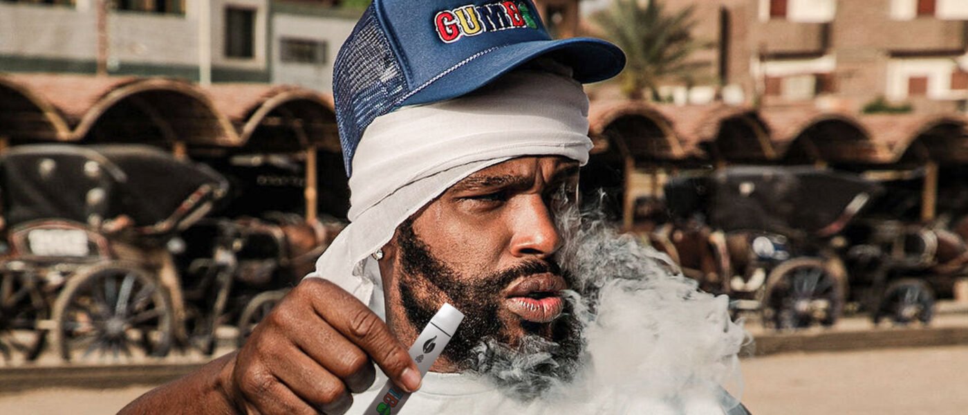 image of a man smoking a gumbo with pen sized